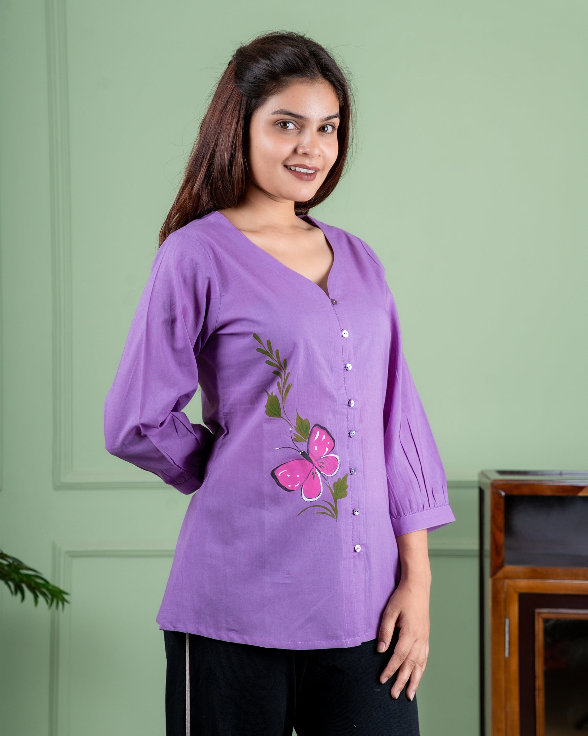 Breathable cotton top with hand-painted floral details, eco-friendly and unique