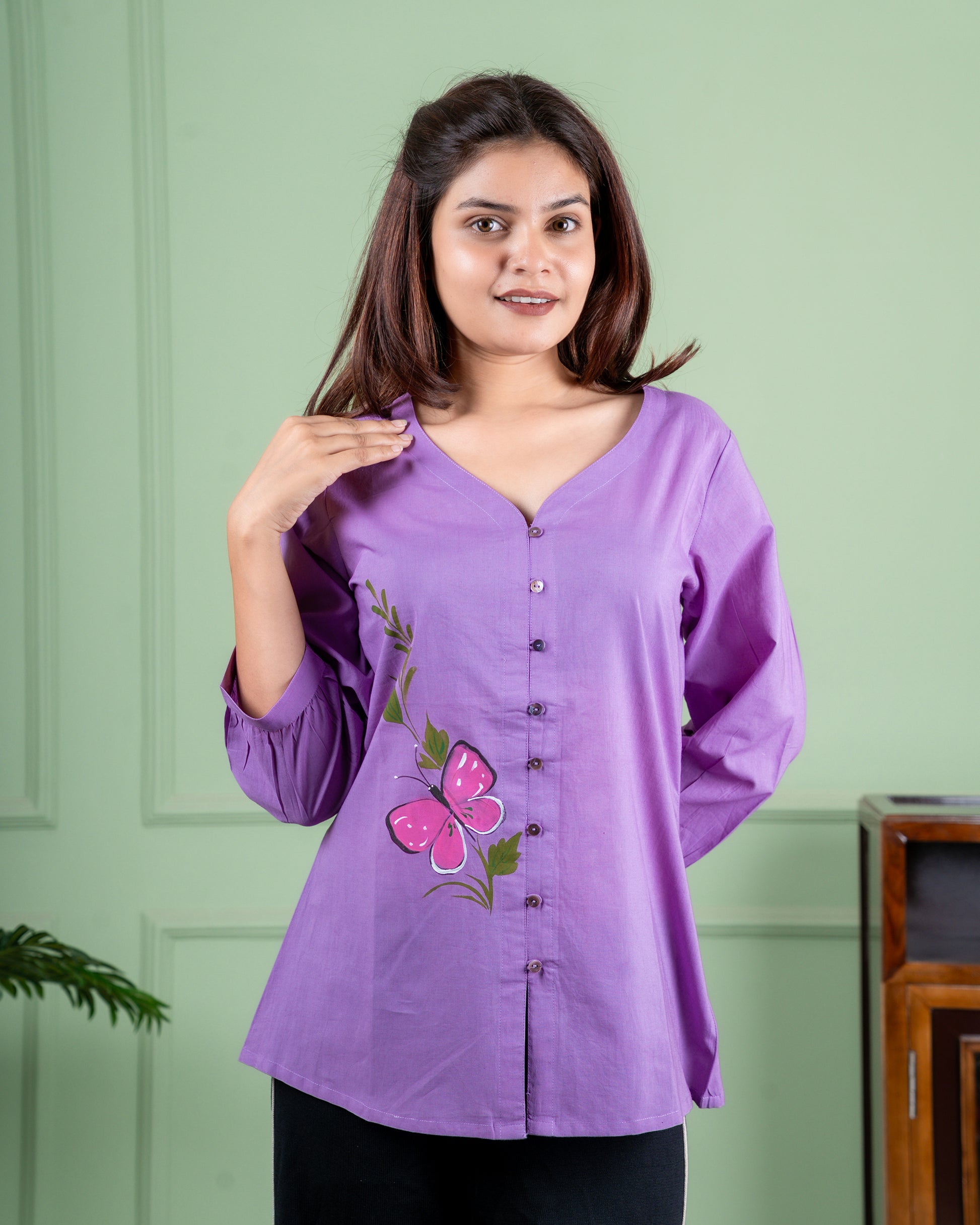 Breathable cotton top with hand-painted floral details, eco-friendly and unique