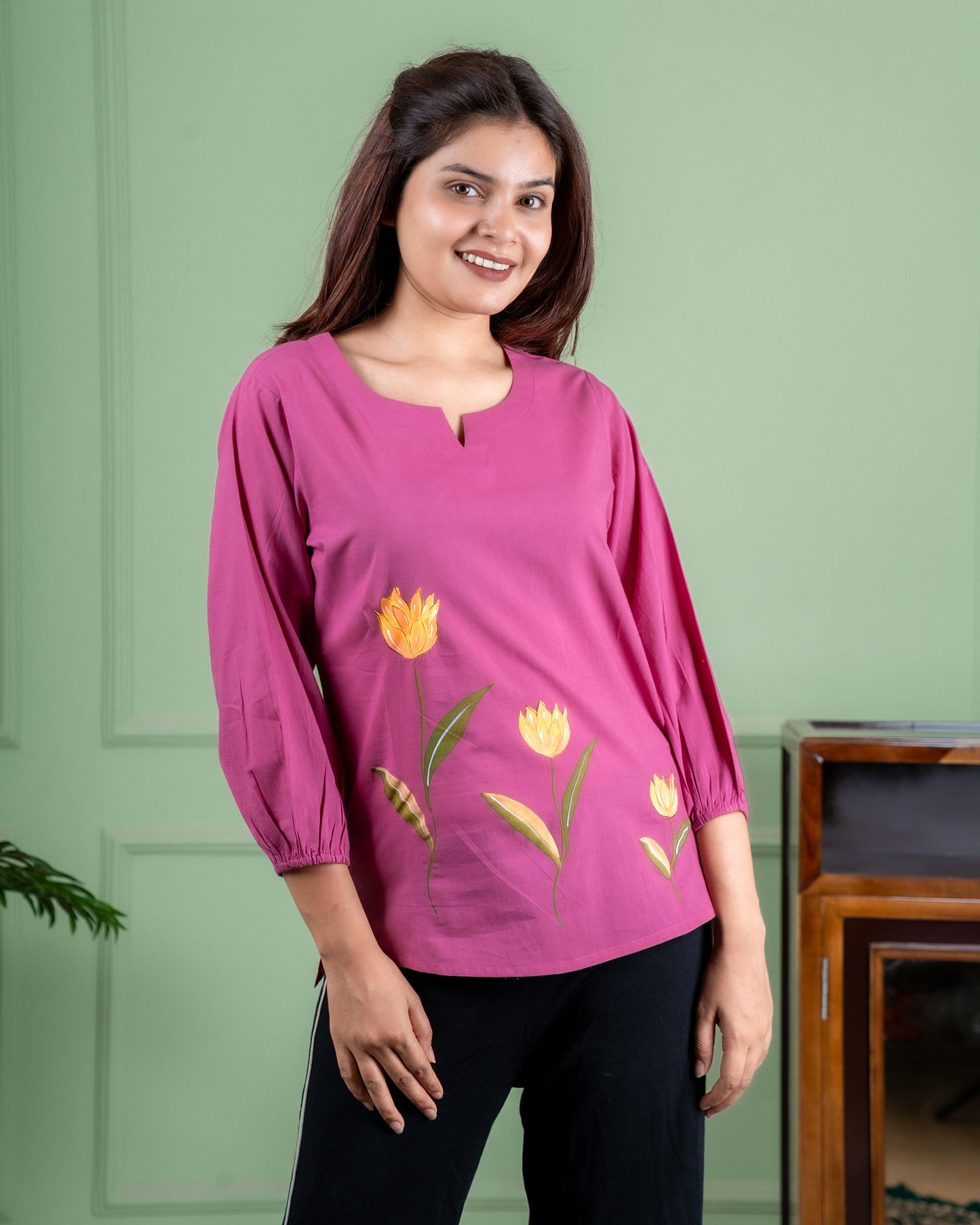 Artisan-made cotton top featuring hand-painted flowers, crafted in Jaipur