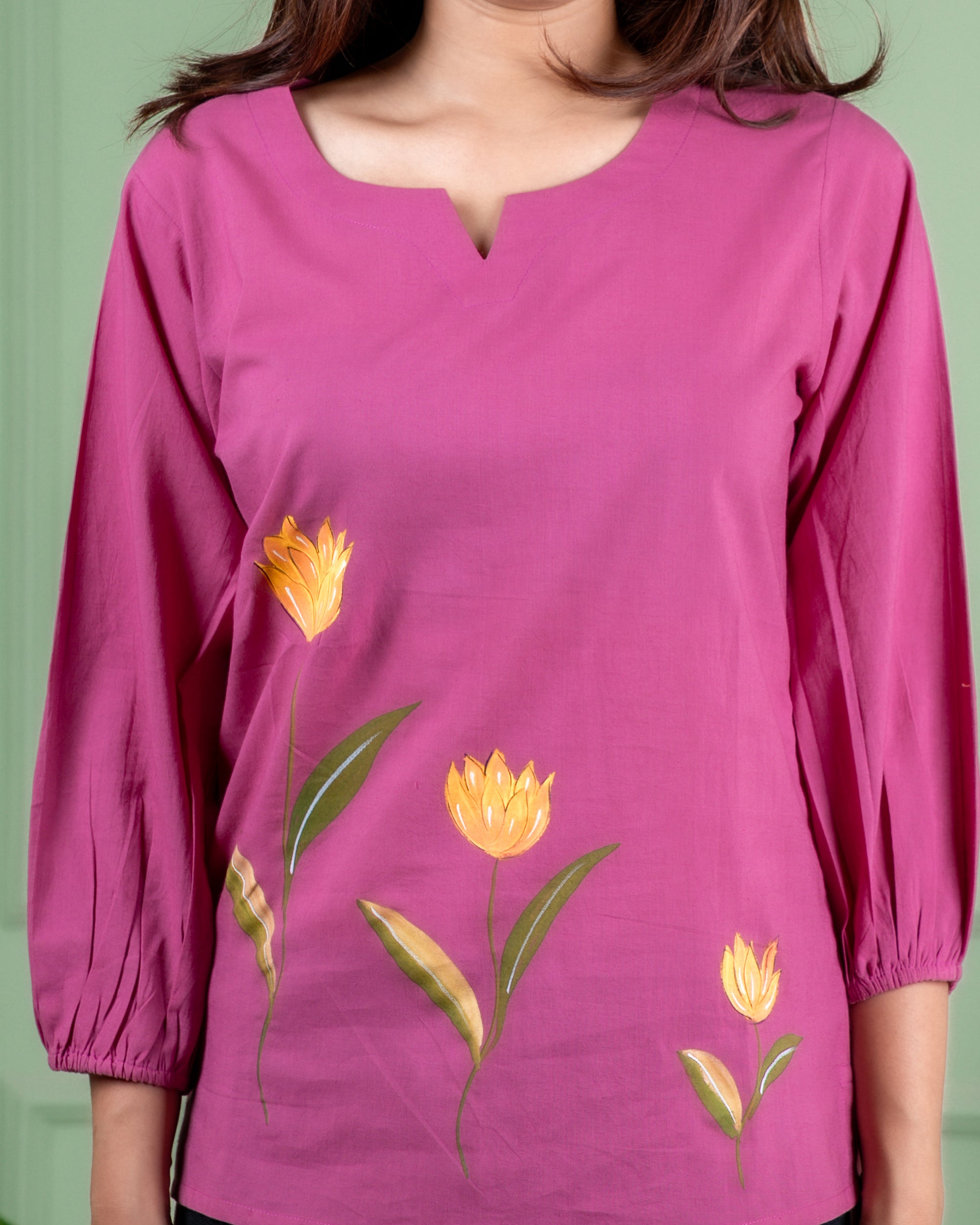 Artisan-made cotton top featuring hand-painted flowers, crafted in Jaipur