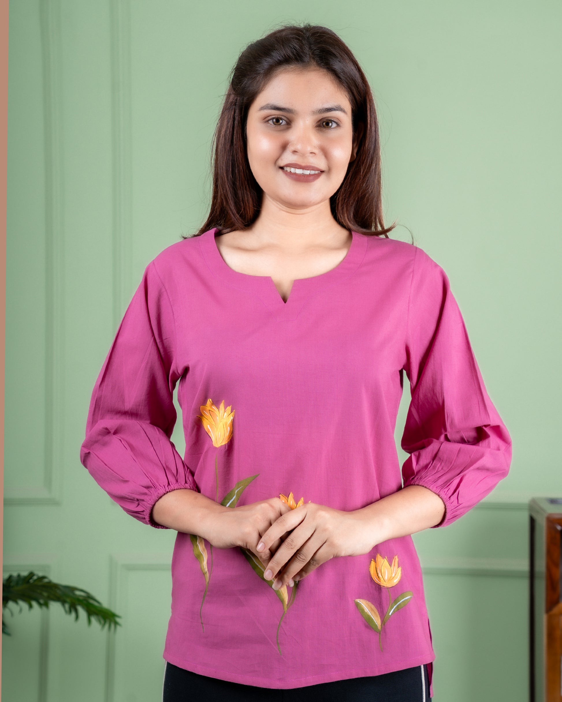 Artisan-made cotton top featuring hand-painted flowers, crafted in Jaipur