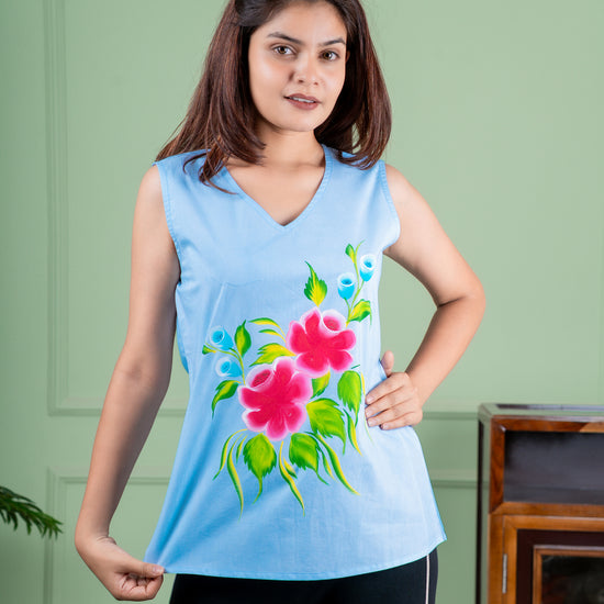 Breathable cotton top with hand-painted floral details, eco-friendly and unique